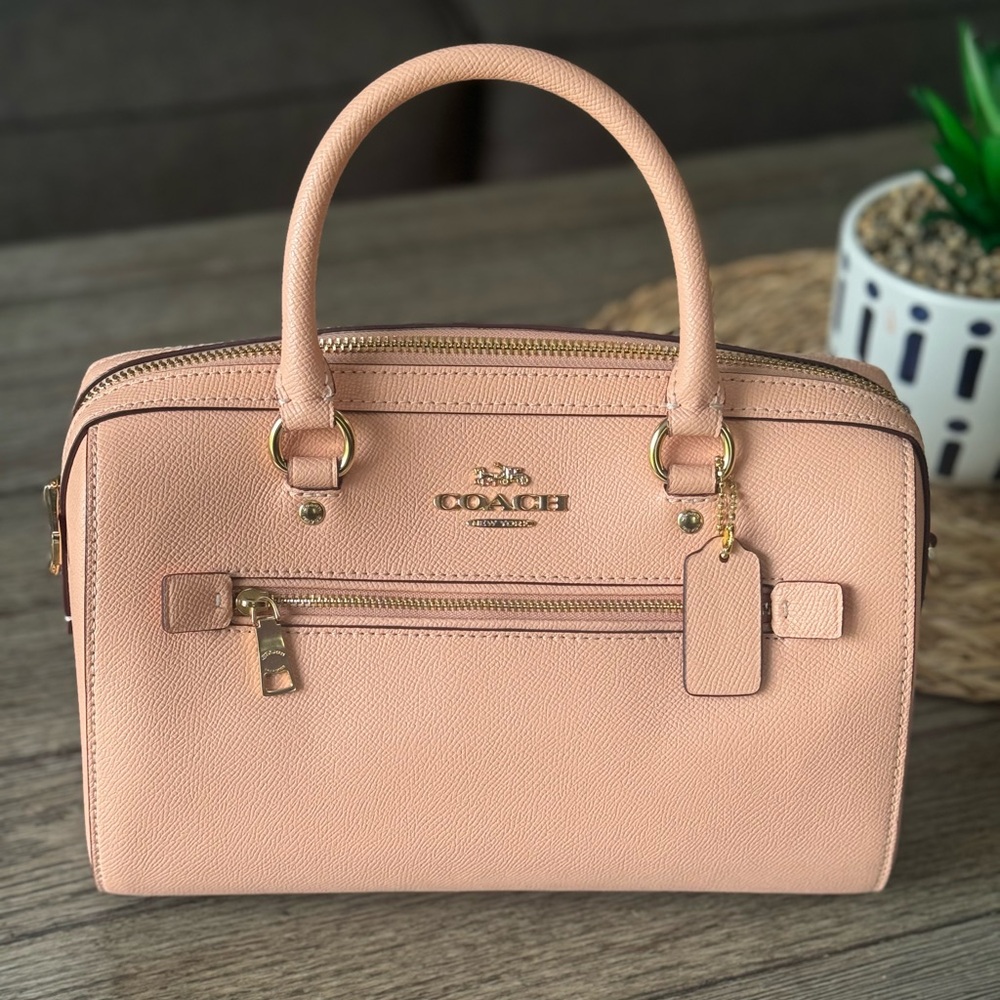 Light pink Coach, mini bag with optional shoulder strap